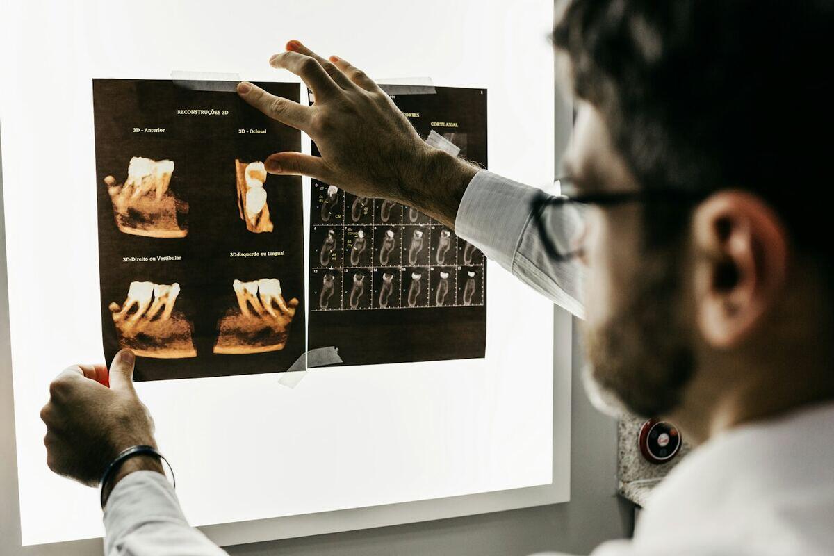 Dentist reviewing an X-ray